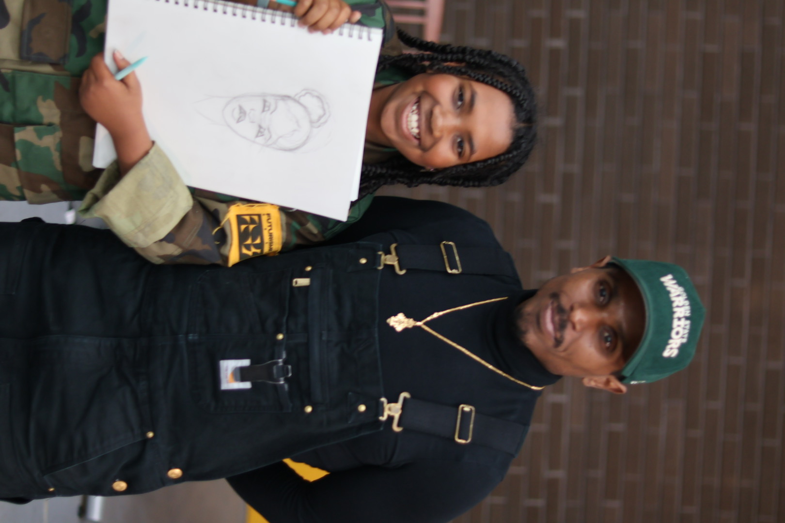 Prince Academy student displaying artwork